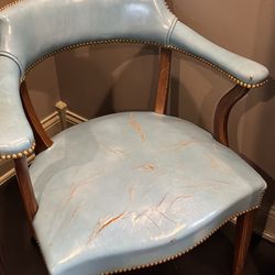 Pair of vintage blue leather pub chairs