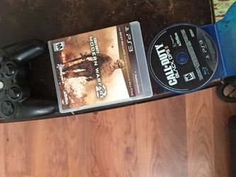 Ps 3 call of duty ...modern warfare 2 & call of duty black ops 2 & PlayStation wireless remote !!