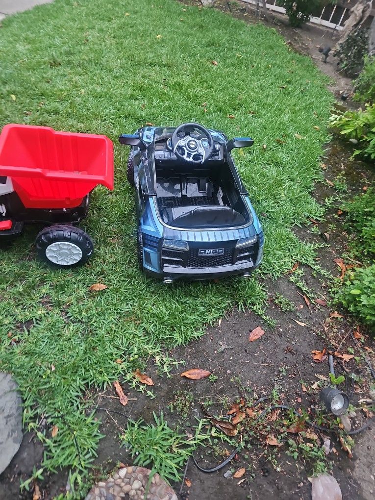 2 Kids Expebisve Battery Car Batman Or Truck Needs Charger