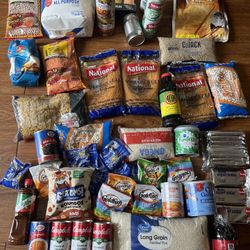 NOT FREE NOT EXPIRED. All These Flour, Spices, Crackers,Hot Sauce, Vanilla Sauce . Dried and Food Cans for 20$