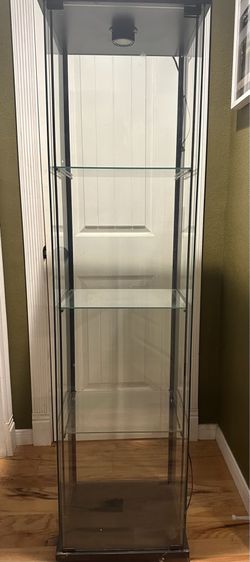 Display case 64” tall by 15 3/4 wide 14” deep