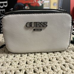 Fashionable a crossbody bag, specifically the white version in silver