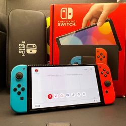 NEW IN BOX NINTENDO SWITCH OLED +25 GAMES + WARRANTY +DOCKING STATION