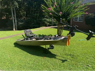 Kayak with trolling motor and battery