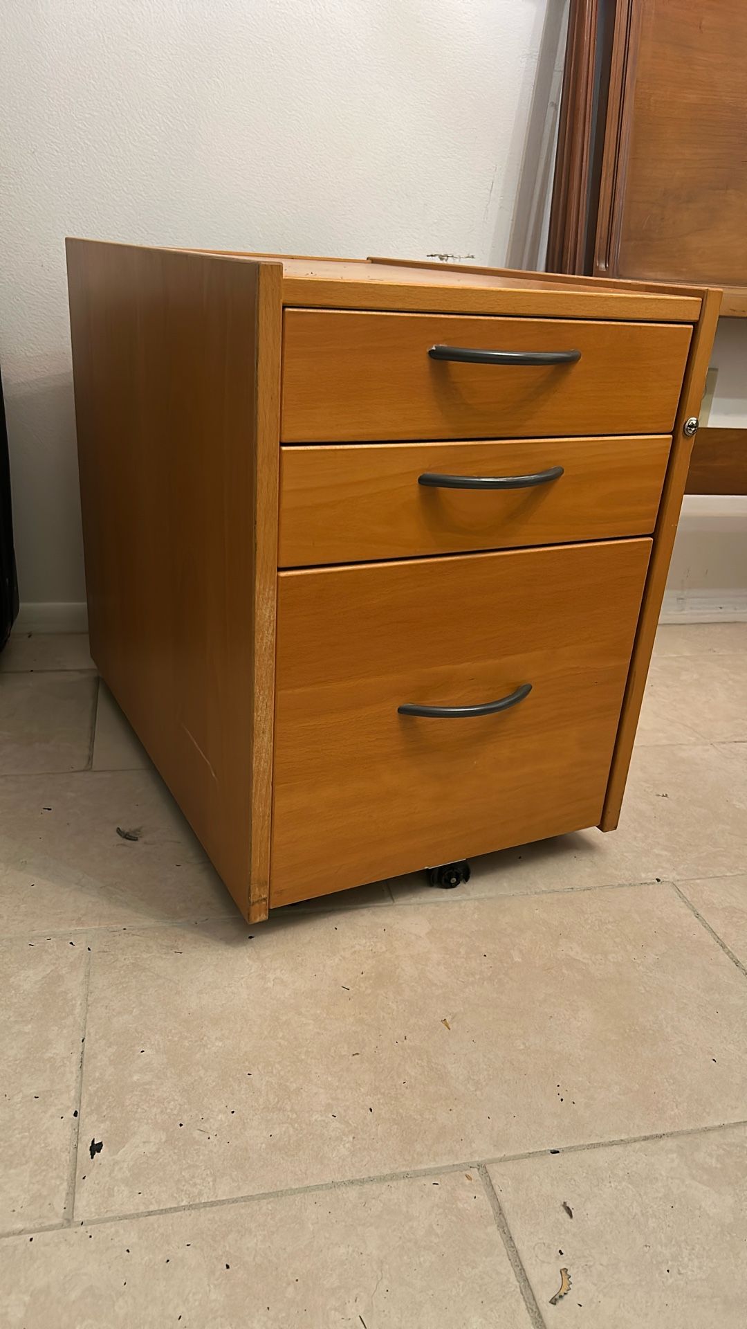 Free wood file cabinet.