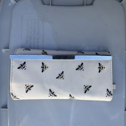  white wallet with a bee print