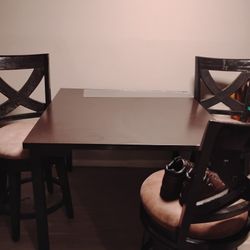 Table And Swivel Chairs 