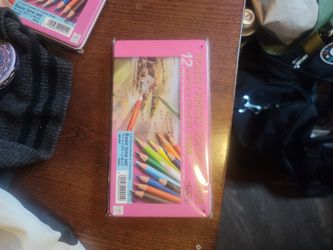Holding Artist Colored Pencils