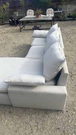 Two piece sectional white sofa