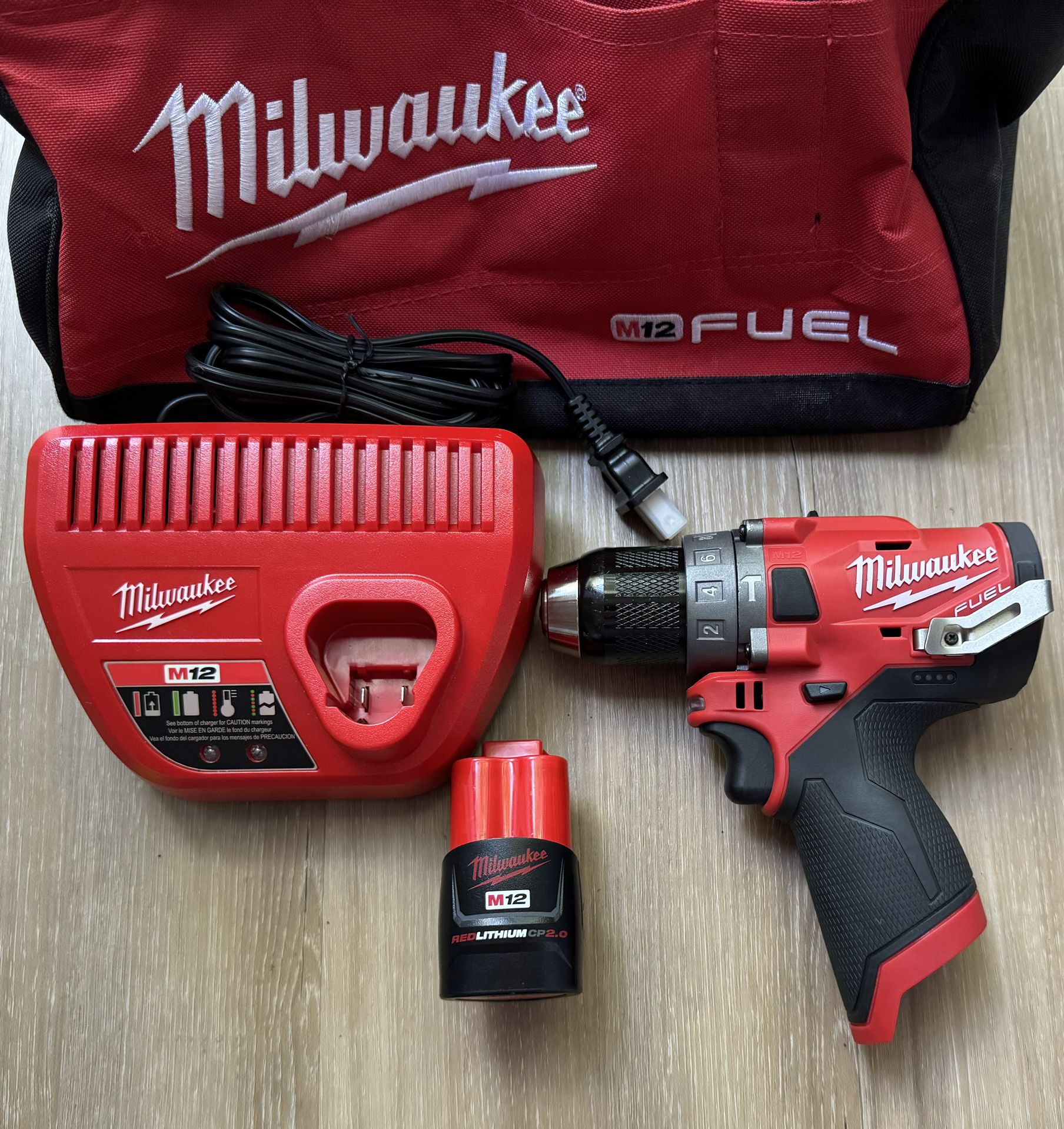 Milwaukee M12 Fuel Hammer Drill + Battery + Charger + Bag