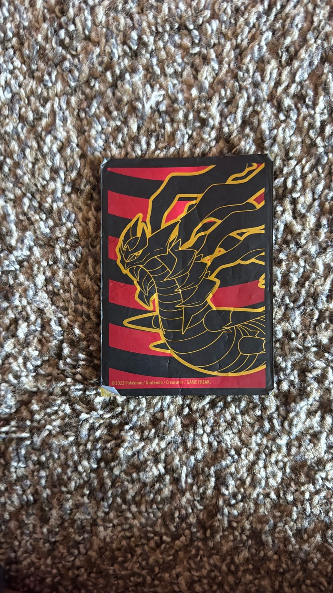 Golden case to hold Pokémon Cards