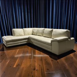 (Sold) Ivory Leather Sectional Sofa with Left Facing Chaise — $3.2k Retail