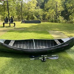Radisson Canoes W/paddles & Anchor 