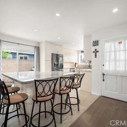 Six Black Metal Bar Stools w/ Upholstered Seats