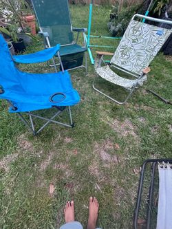 Set of three folding chairs