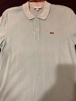 $25- Men’s aqua blue Lacoste polo shirt