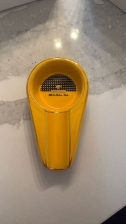 This yellow ceramic ashtray features the Cohiba La Habana logo and design