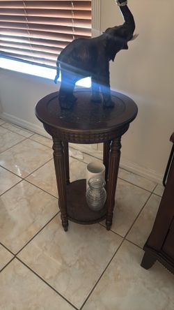 Small brown round table