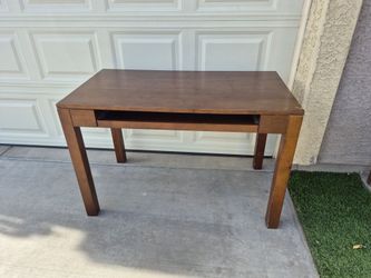 44" width X 24" depth X 29" height,  wood desk in good condition