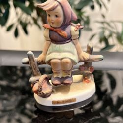 Hummel Figurine girl sitting on fence “Just Resting”