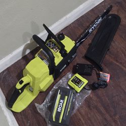 RYOBI 40 VT BRUSSELS CJAIN SAW + BATTER AND CHARGER