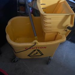 Janitorial Bucket With Wringer & Mop $25