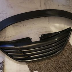 Flat black spoiler and grill for a 2011& up Hyundai sonata
