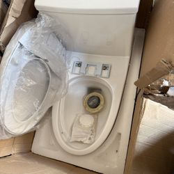 Toilet With Bidet, Open Box, Never Used.