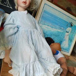 Vintage Porcelain doll. 2ft tall
