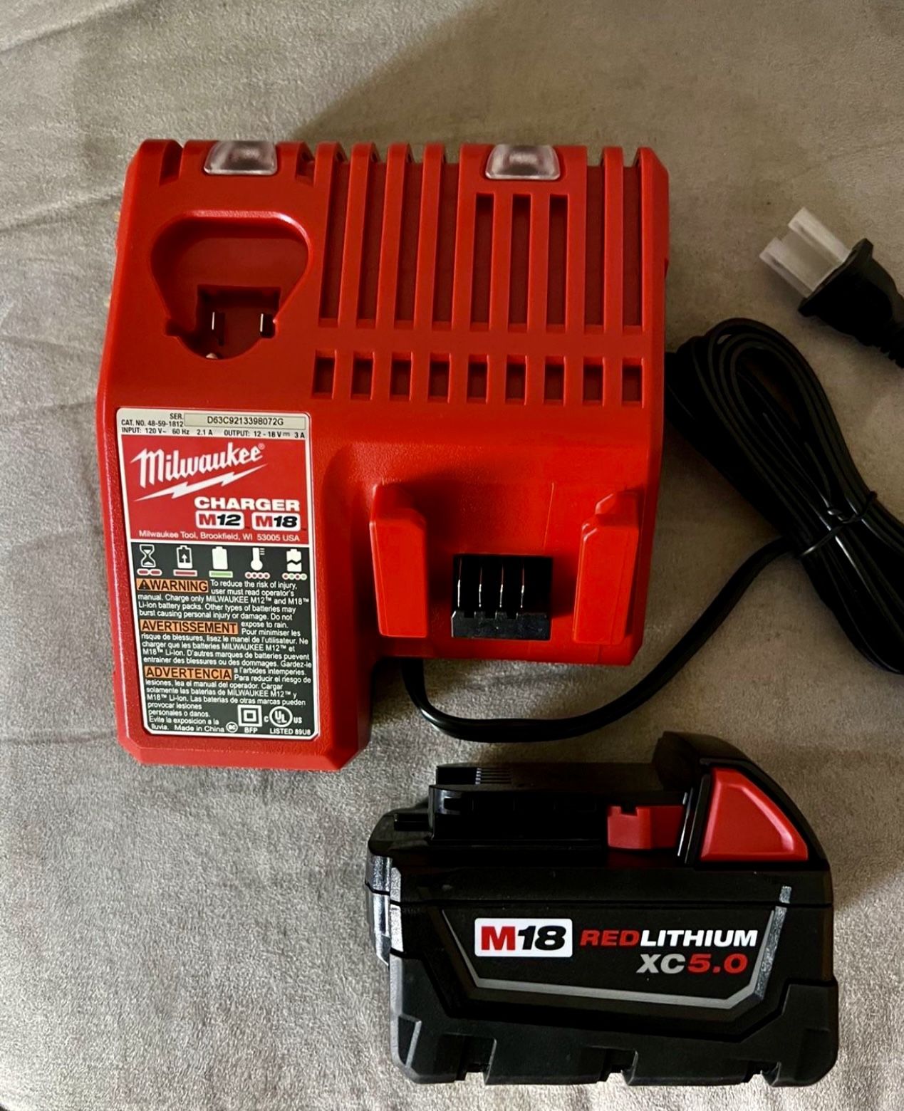 Milwaukee M18 Combo Charger And XC 5.0 Battery