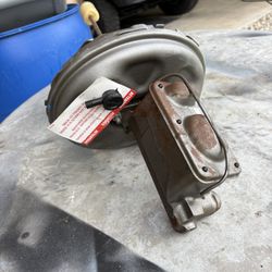 Remanufactured power brake booster with master cylinder