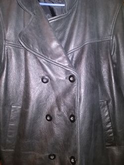 100% leather jacket. Small size runs to medium. Like New!