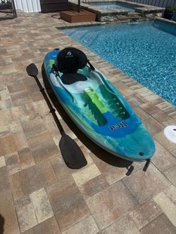 8 1/2’  Mainstream (Beat) rotomolded, unsinkable, kayak w/ paddle and seat back