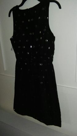 Gorgeous Dress Black with accents on silver color. Accessories, purses it's not including!