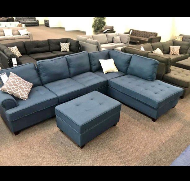 Navy blue large sectional sofa with ottoman