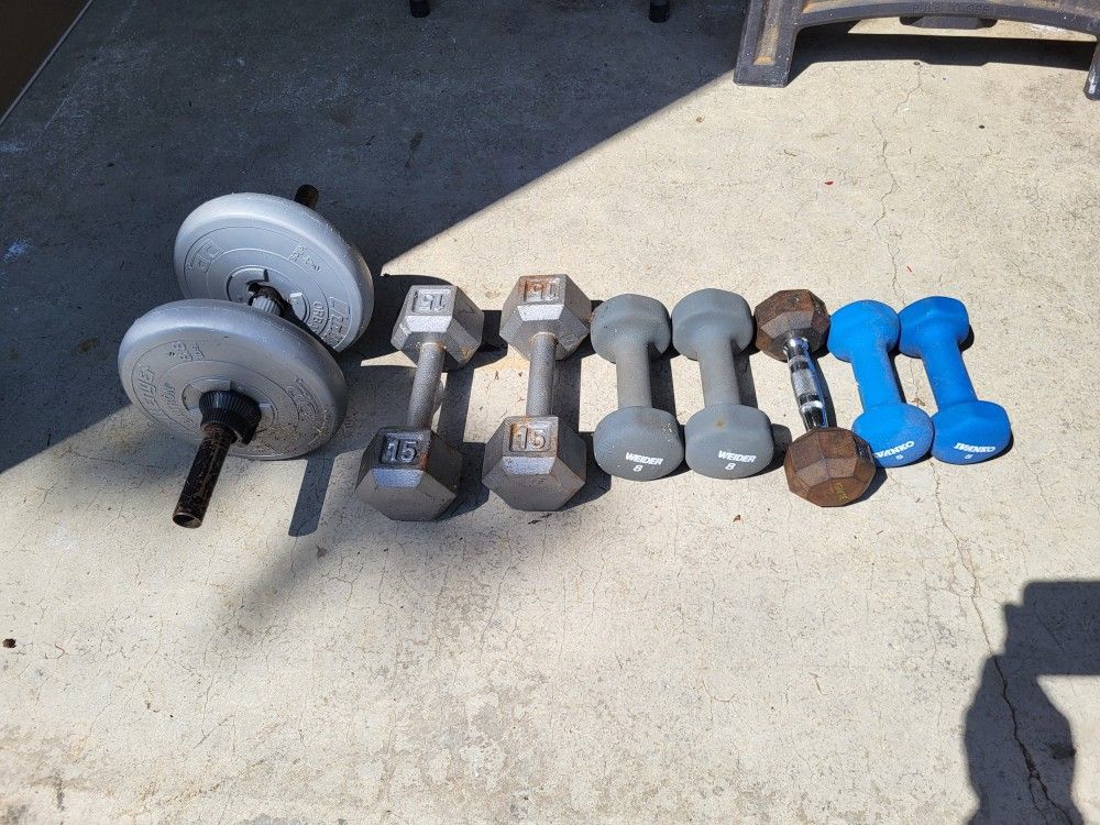 Assorted Dumbbell Hand Wieghts And Barbell