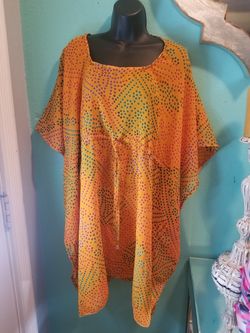 Yellow multi colored coverup for bathing suits and summer..true size ..one size fits all....brand new!