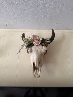 Skull with fake roses