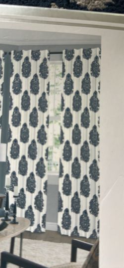 White and blue patterned curtains