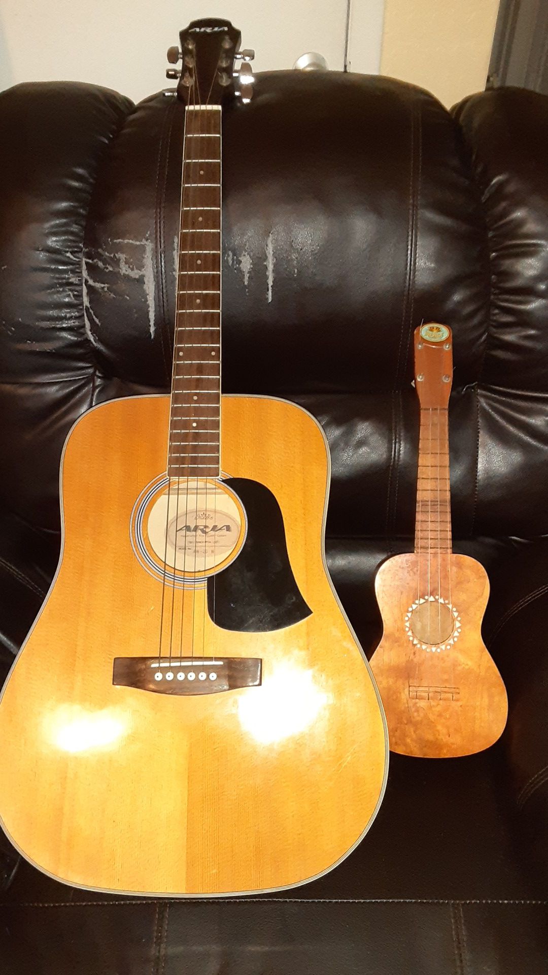 Regal ukulele and Aria guitar