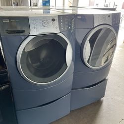 Kenmore Washer and Electric Dryer on pedastool