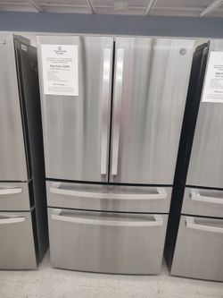 $2199 GE 278.7 Cu Ft 4 door French door refrigerator with auto fill pitcher
