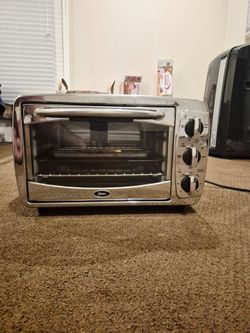 Oster 1400W 6-slice Stainless Steel Convection Toaster Oven