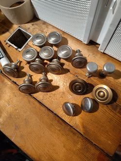 Cabinet knobs set of 11 are same and all are new including other 6 different ones