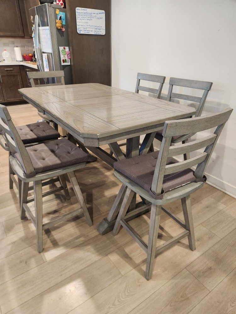 Expandable Dinning table with 6 rotating chairs