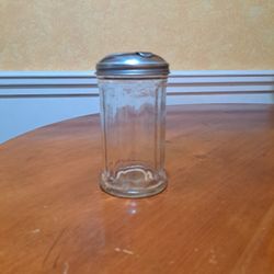 Sugar dispenser/pourer, glass 5 1/2 in tall. 