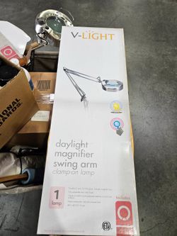 Lamp with magnifier and light