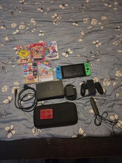 Nintendo Switch with Accessories and games