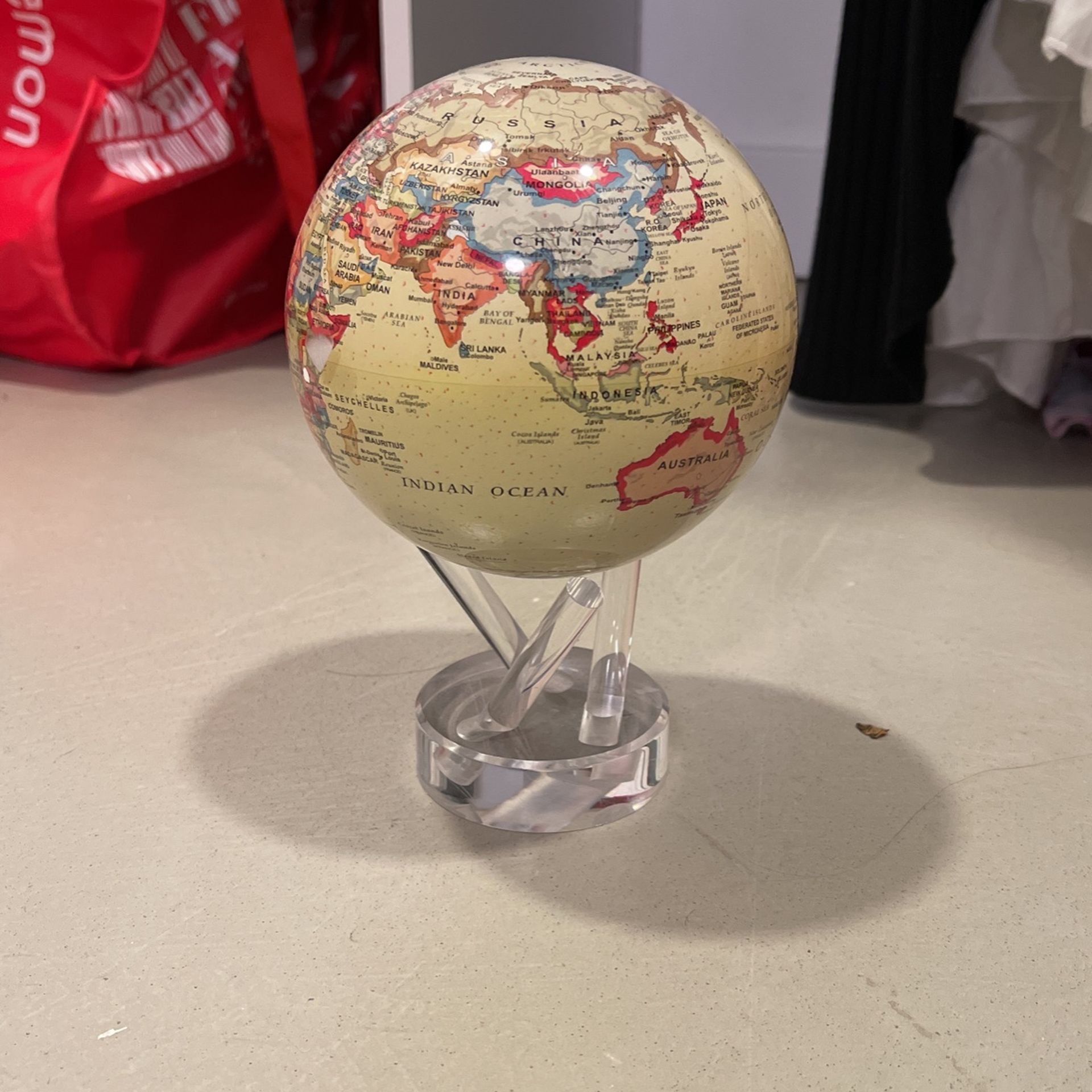 Self Rotating Glass Globe With Stand 