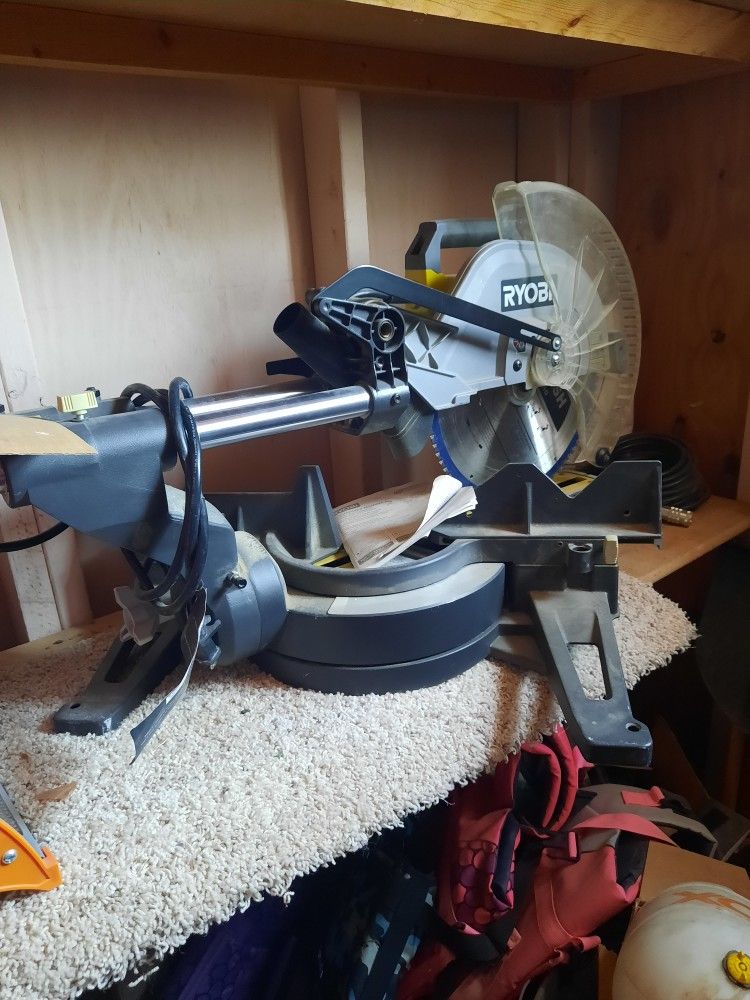 Ryobi  twelve inch sliding compound Miter saw.